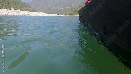 traditional wood boat running at river low angle view photo