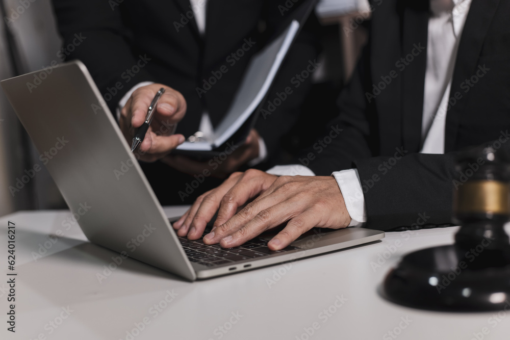 Male lawyer working with contract at desk, justice and law concept. Male lawyer working with contract at desk, justice and law concept.