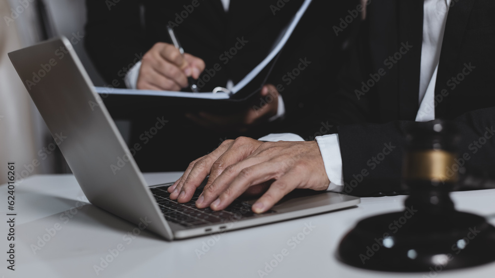 Male lawyer working with contract at desk, justice and law concept. Male lawyer working with contract at desk, justice and law concept.