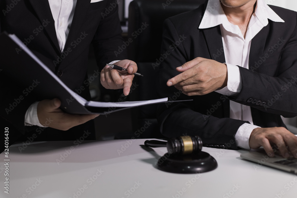 Male lawyer working with contract at desk, justice and law concept. Male lawyer working with contract at desk, justice and law concept.