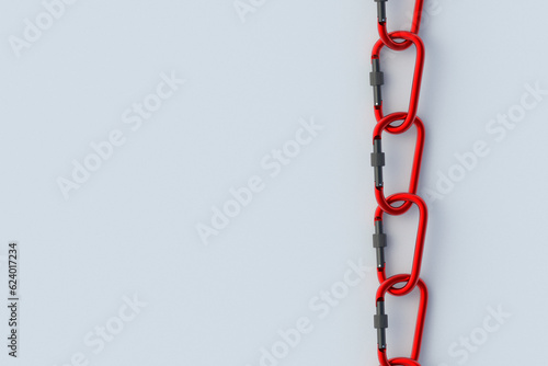 Chain made from red carabiners. Carabines for mountaineering. Accessory for extreme sports. Work on high altitude. Top view. Copy space. 3d render photo