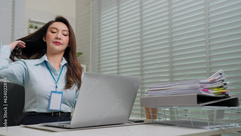 Confident asian businesswoman holding laptop go to sit at table open and start working in the morning or after meeting in office. Business and workplace concept Confident asian businesswoman holding laptop go to sit at table open and start working in the morning or after meeting in office. Business and workplace concept