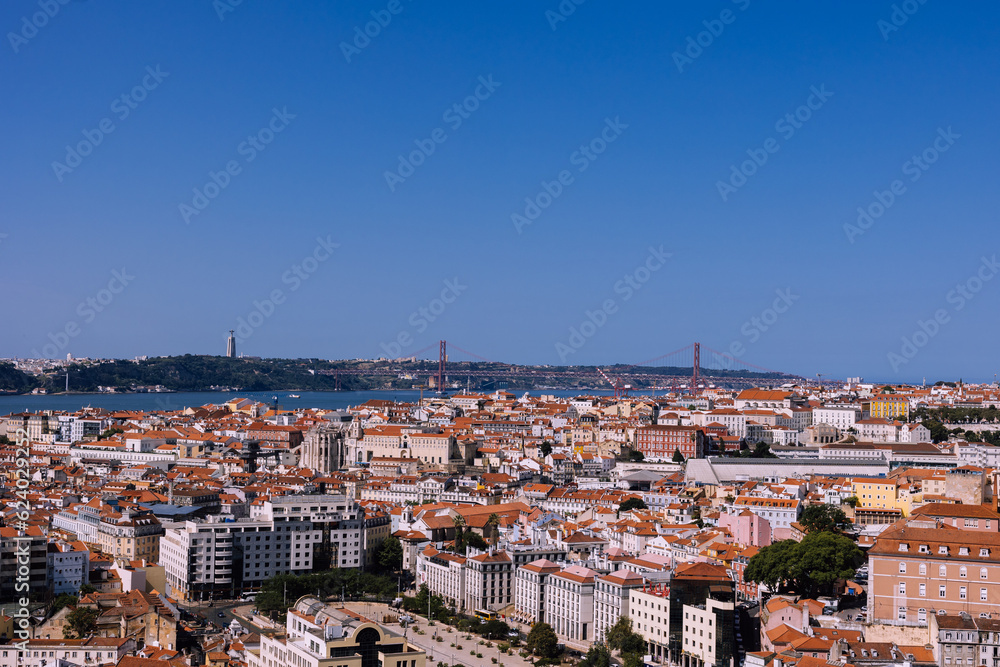Panoramic view of Lisbon Portugal with Cristo Rei and 25 de Abril Bridge in background