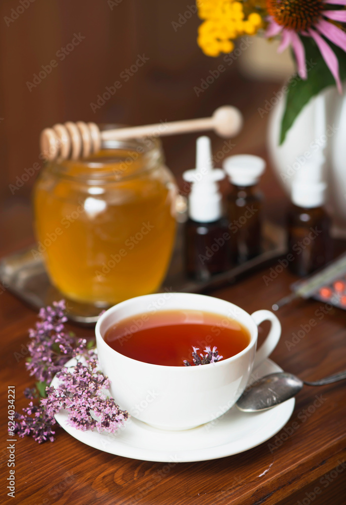 Still life from medicinal herbs, honey, herbal tea and medicines Still life from medicinal herbs, honey, herbal tea and medicines