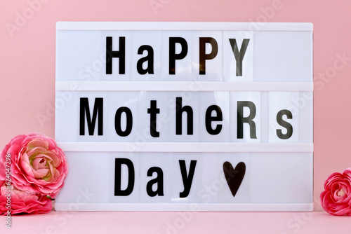 Happy Mother's Day led light box sign board on pink background.