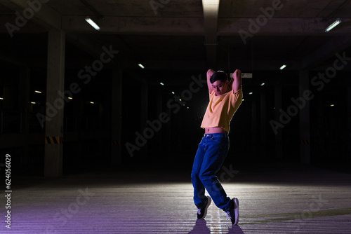 Male street dancer looking cool and funky while dancing