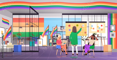 mix race girls in colorful clothes working in office lgbt rainbow flag transgender love generation Z concept