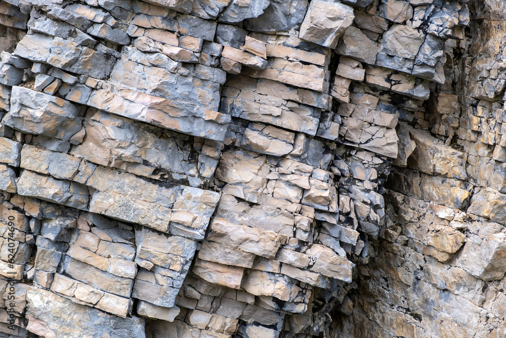 Layered empty rock, limestone, sandstone, slate formation background, texture. Copy space Layered empty rock, limestone, sandstone, slate formation background, texture. Copy space