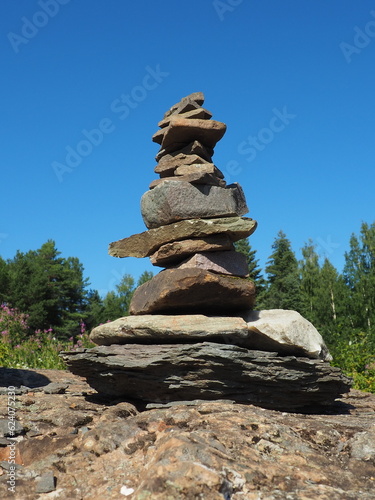 Seid, a sacred object of the North European peoples Saami Lapps. Tour gurii, artificial structure, a pile of stones in conical shape. Stone mounds, a stone core in earthen mounds. A dolmen. Karelia.