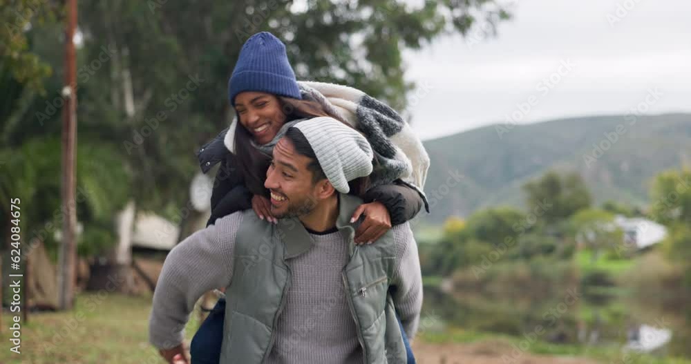 Hiking, piggyback or happy couple on break to relax on holiday vacation trip together in nature. Smile, campers or woman smiling or laughing with funny man camping outdoors in forest or park in Peru Hiking, piggyback or happy couple on break to relax on holiday vacation trip together in nature. Smile, campers or woman smiling or laughing with funny man camping outdoors in forest or park in Peru