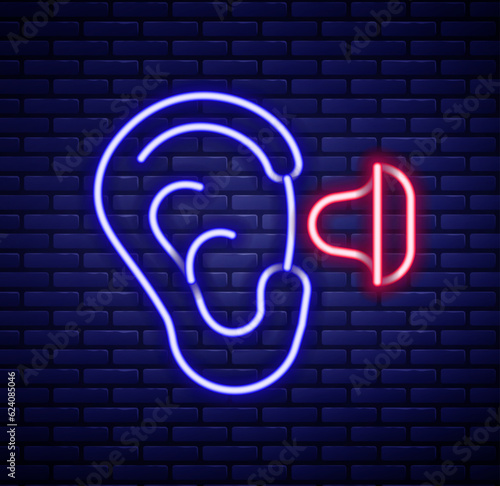 Glowing neon line Earplugs and ear icon isolated on brick wall background. Ear plug sign. Noise symbol. Sleeping quality concept. Colorful outline concept. Vector