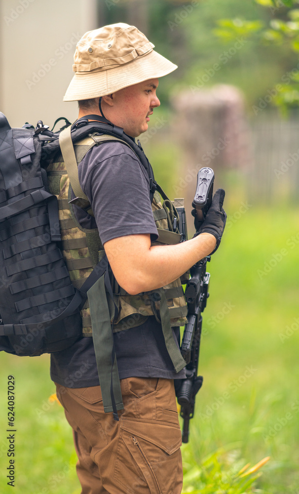 Vertical image of an armed man