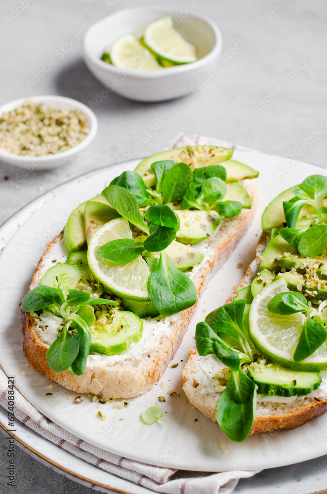 Avocado Toasts, Healthy Snack or Breakfast on Bright Background Avocado Toasts, Healthy Snack or Breakfast on Bright Background