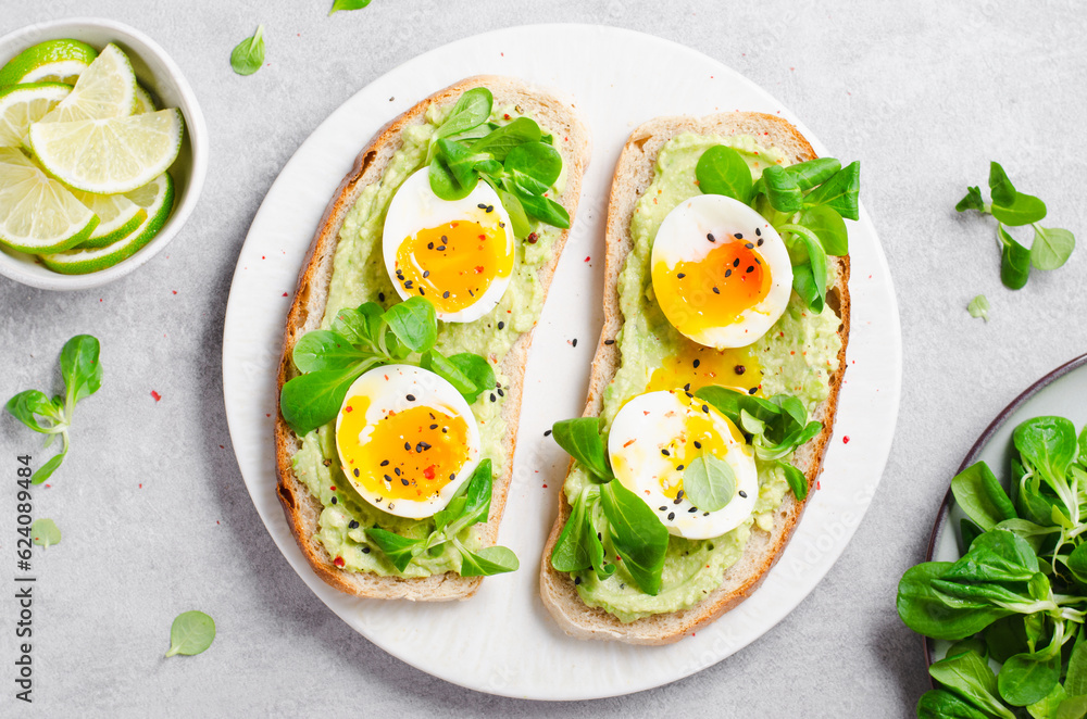 Avocado Egg Toast, Healthy Snack or Breakfast on Bright Background Avocado Egg Toast, Healthy Snack or Breakfast on Bright Background