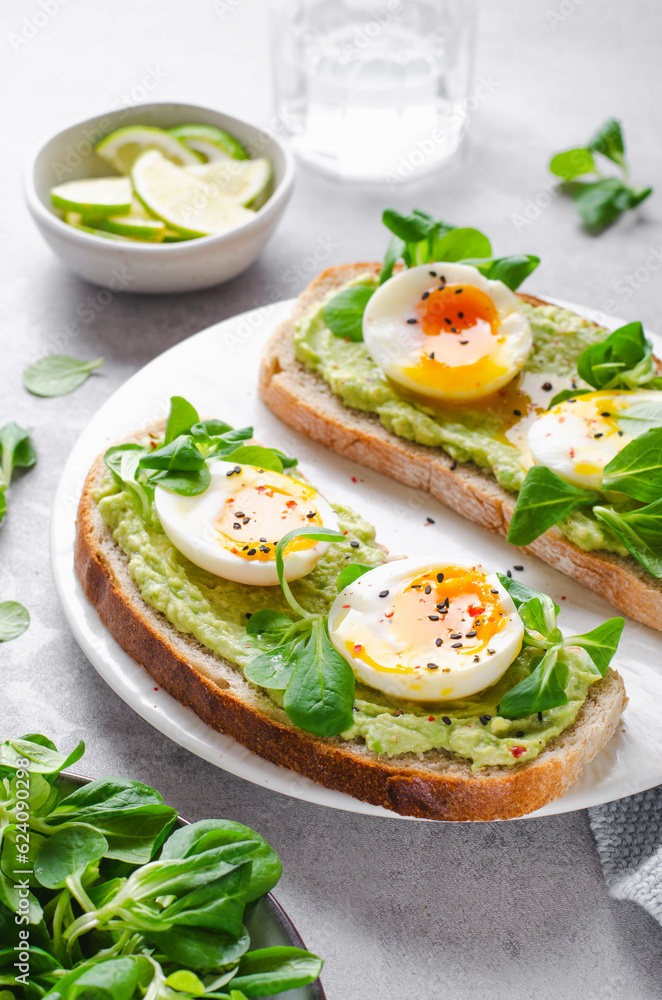 Avocado Egg Toast, Healthy Snack or Breakfast on Bright Background Avocado Egg Toast, Healthy Snack or Breakfast on Bright Background