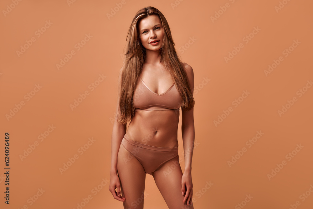 Multiethnic women on beige background Multiethnic women on beige background