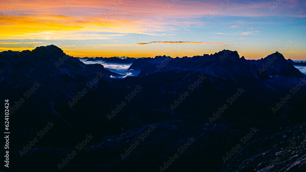 Mountains at sunrise in the Dolomites. Top view of Tofana di Dentro.