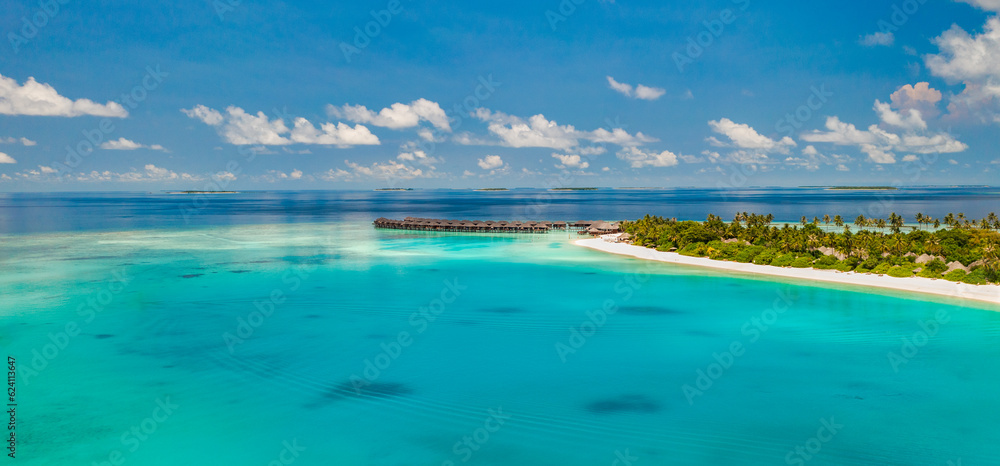 Maldives paradise island. Tropical aerial landscape, seascape pier, water bungalows villas amazing sea lagoon beach. Exotic tourism destination, summer vacation. Beautiful nature, palm trees sea sky