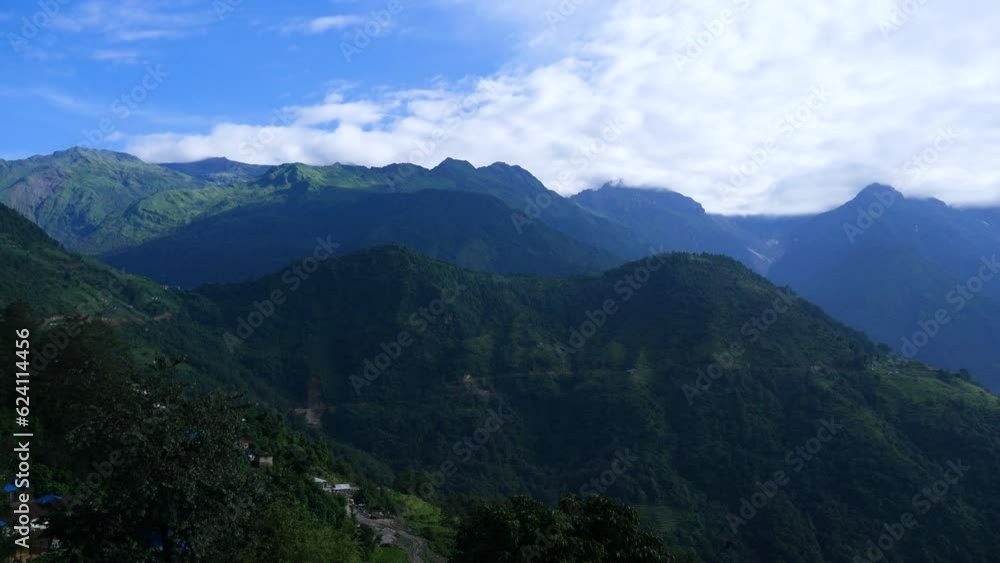 landscape with clouds and green hills in a timelapse landscape with clouds and green hills in a timelapse
