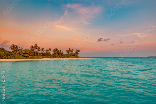 Fototapeta Naklejka Na Ścianę i Meble -  Fantastic closeup calm sea waves, sand with colorful sunrise sunset light sky. Tropical island beach. Travel landscape, exotic shore coast. Summer vacation holiday amazing nature. Relax paradise scene