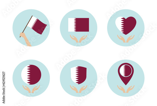 qatar national flag in hand