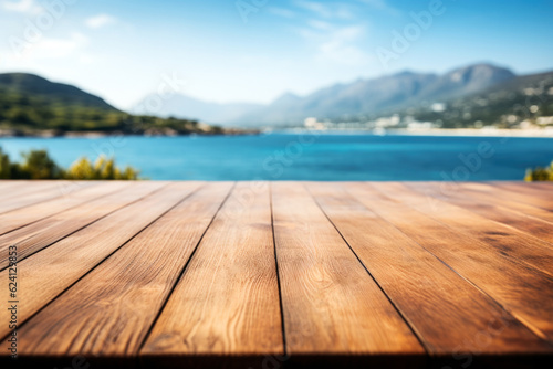 Valokuvatapetti Empty wooden floor for product display montages with sea and mountain background