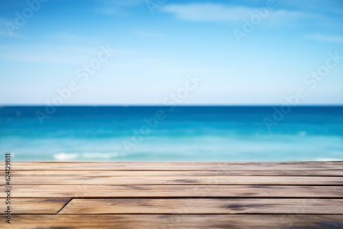 Wooden deck table on blurred seascape background - can be used for display or montage your products. High quality photo