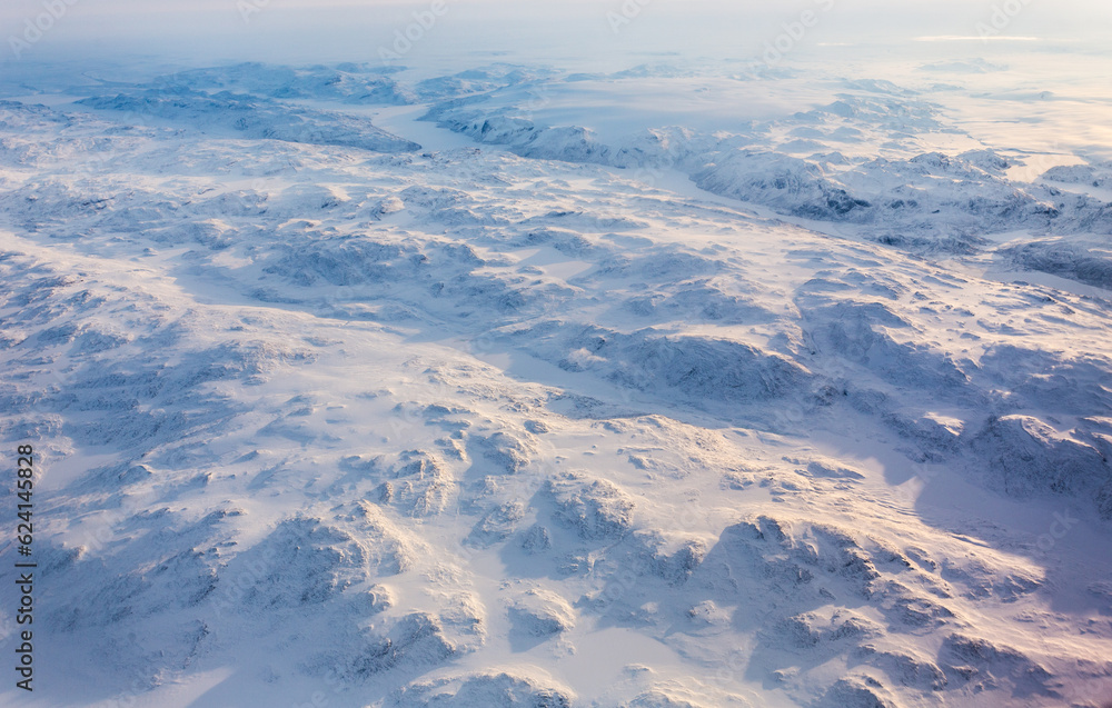 Greenlandic ice cap with frozen mountains and fjords aerial view, near Nuuk, Greenland