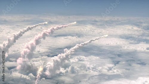 Launched Missiles flying above the clouds, 30 FPS. photo