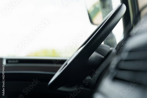 Wallpaper Mural The steering wheel in the cab of the truck, the image of the dashboard is blurry. Torontodigital.ca