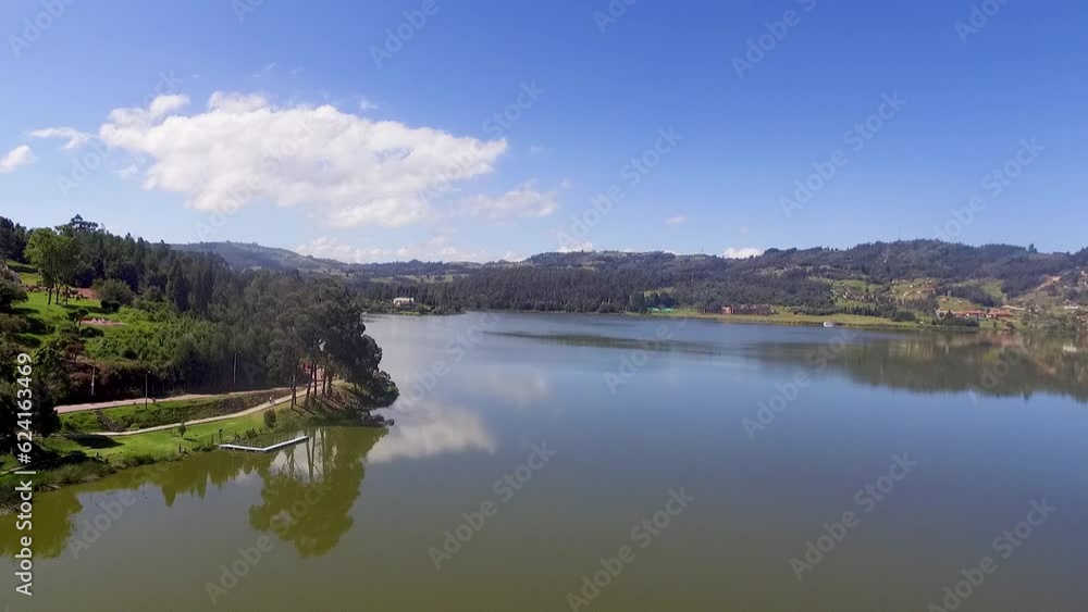Aerial top view of blue lakes with islands and green forests in colombia. Beautiful summer landscape. Aerial top view of blue lakes with islands and green forests in colombia. Beautiful summer landscape.