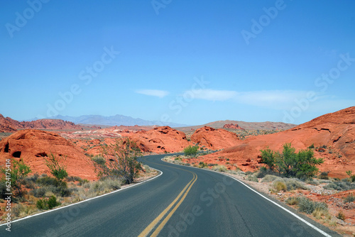 Winding road in red colorful desert mountain in southwest USA