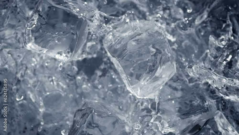 Super Slow Motion Shot of Falling and Splashing Perfect Ice Cubes into Water at 1000fps. Super Slow Motion Shot of Falling and Splashing Perfect Ice Cubes into Water at 1000fps.