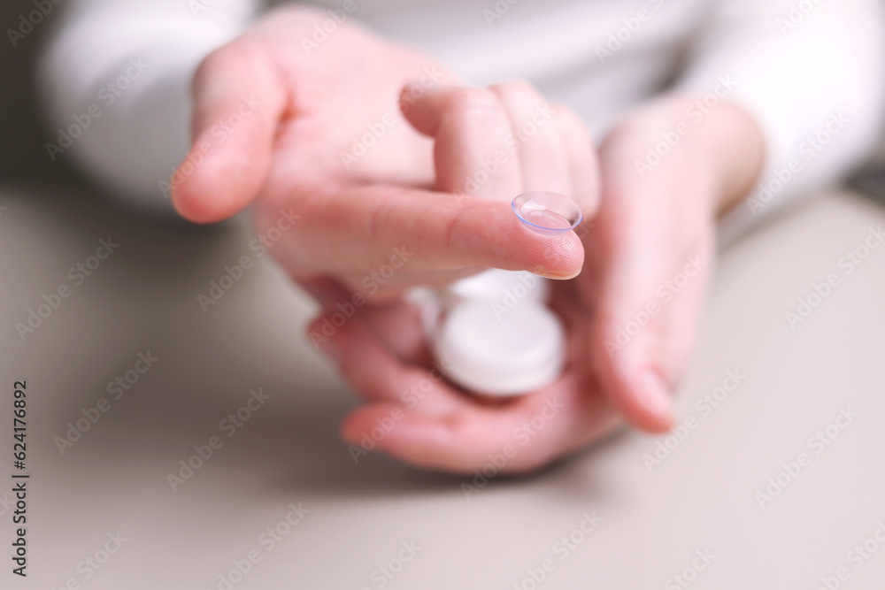 Contact lenses for vision correction in hands Contact lenses for vision correction in hands