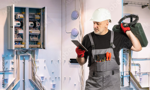 Man electrician. Worker nea...
