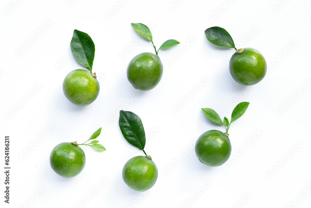 Limes with leaves isolated on white. Limes with leaves isolated on white.