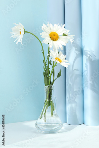 Wallpaper Mural Premium stage for showcasing product and business concept. Minimal modern aesthetic. Beautiful flower arrangement with white daisies, empty product podium, elegant beauty concept Torontodigital.ca