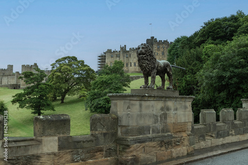 Lion statue on Lion Bridge with Alnick castle in the background