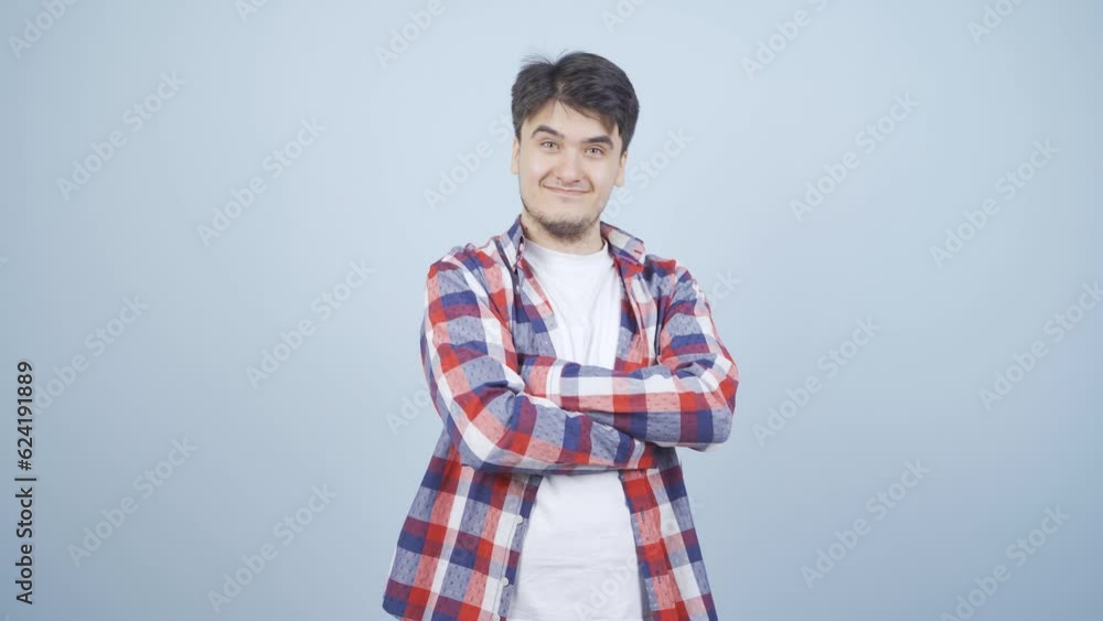 Man looking at camera making confidence sign. Man looking at camera making confidence sign.