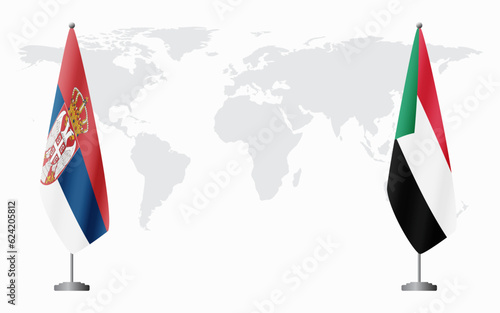 Serbia and Sudan flags for official meeting photo