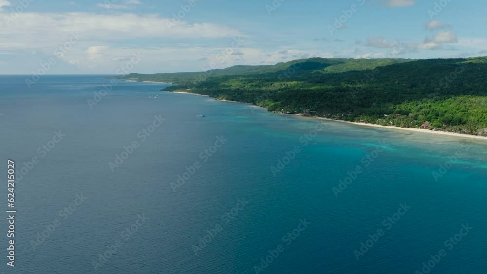 Seascape of tropical island and the deep blue sea surrounded. Summer and travel vacation concept. Siquijor, Philippines. Seascape of tropical island and the deep blue sea surrounded. Summer and travel vacation concept. Siquijor, Philippines.