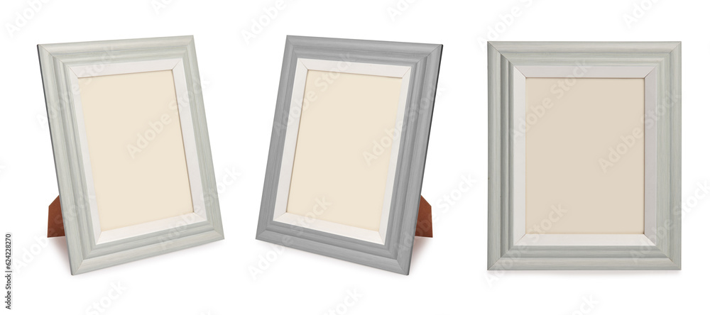 Fototapeta premium Desktop photo frame, Vertical standing brown wooden picture frame on white background,