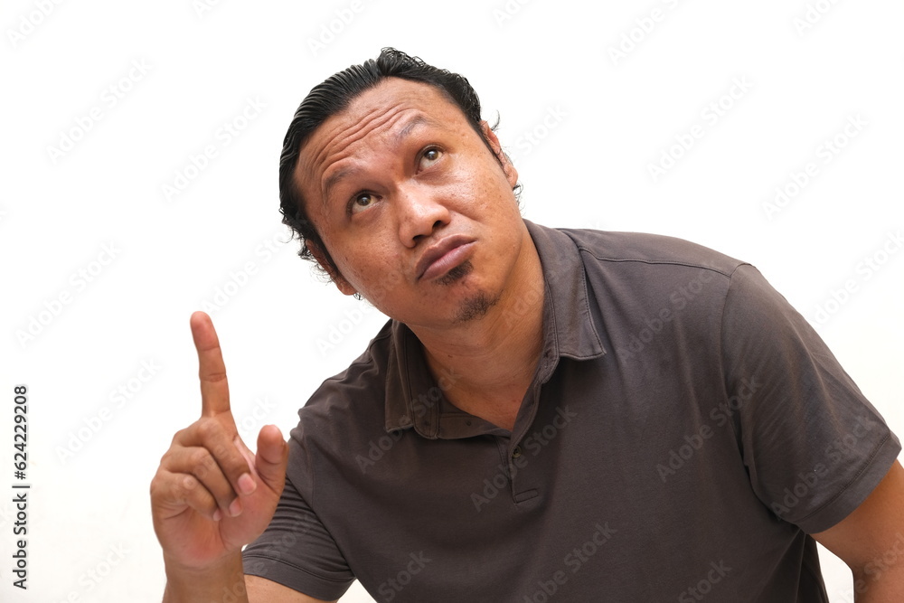 asian man pointing up isolated white background asian man pointing up isolated white background