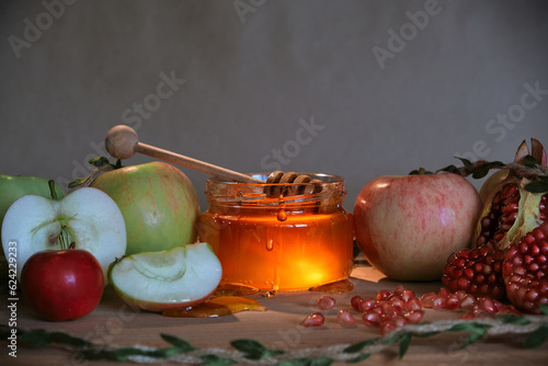 Apples, pomegranate and honey, the traditional food of the Jewish New Year - Rosh Hashana. Copy space background