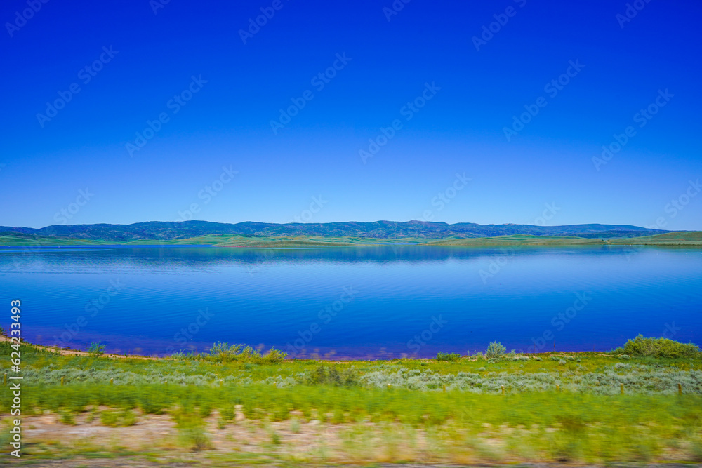 Reflective lake with foreground motion
