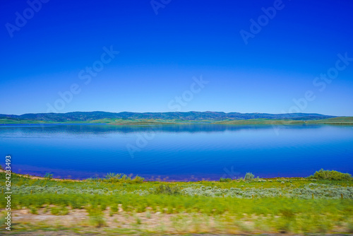 Reflective lake with foreground motion