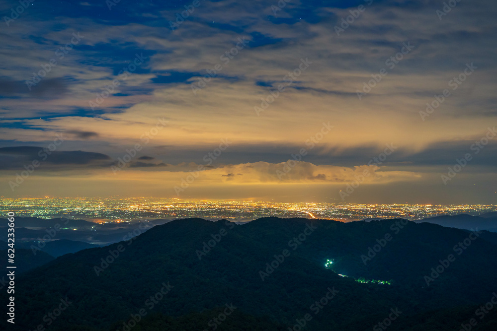 Night cityscape and mountain viewpoint from summit, A million dollar view. (Chiang rai, Thailand)