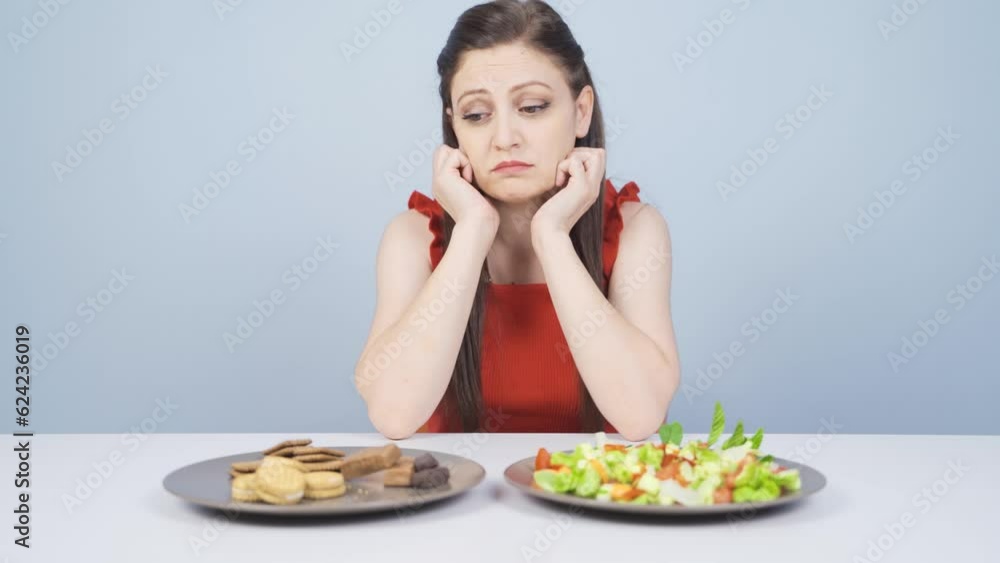 Healthy living choice. Dieter who does not choose harmful foods. Healthy living choice. Dieter who does not choose harmful foods.