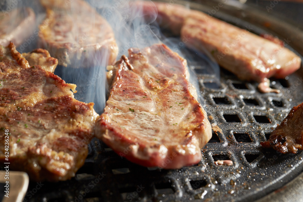 Grilled Pork Shoulder on the grill	