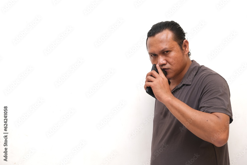 asian man looking ahead with angry emotion asian man looking ahead with angry emotion